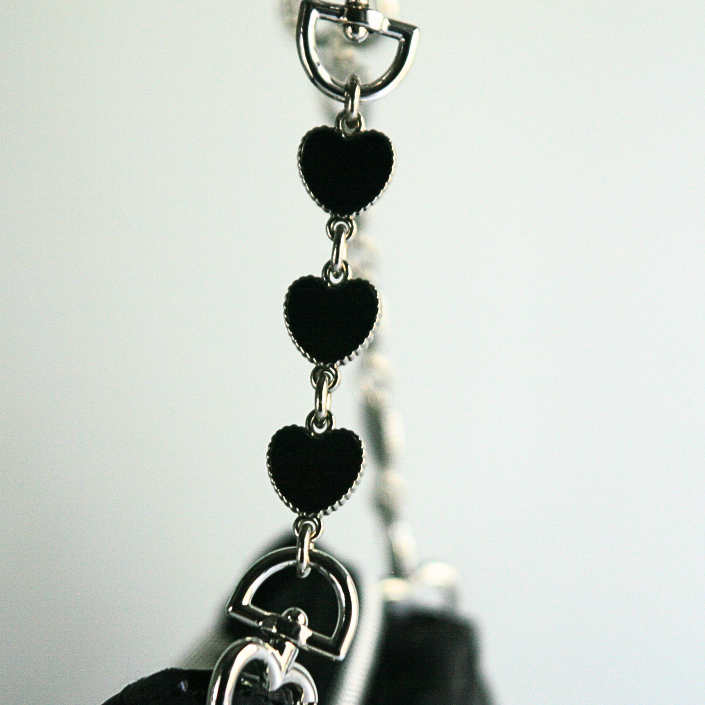 Features black heart strap extenders