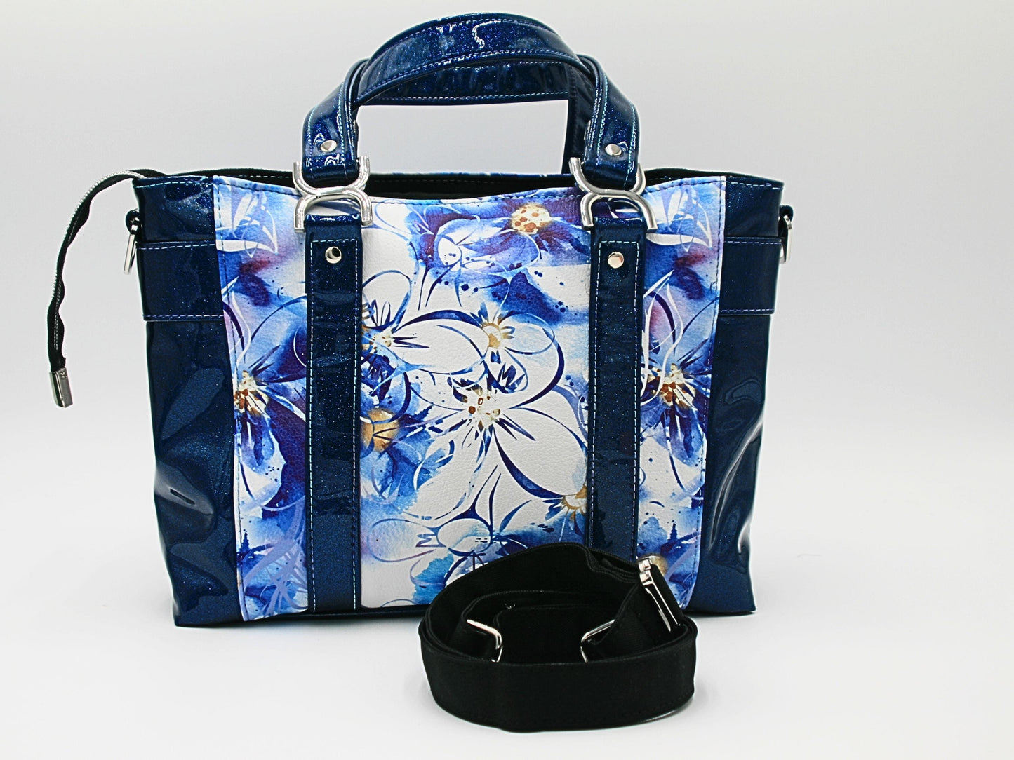 This is the back of the floral glitter vinyl tote bag which is identical to the front. Both front and back have slip pockets between the straps