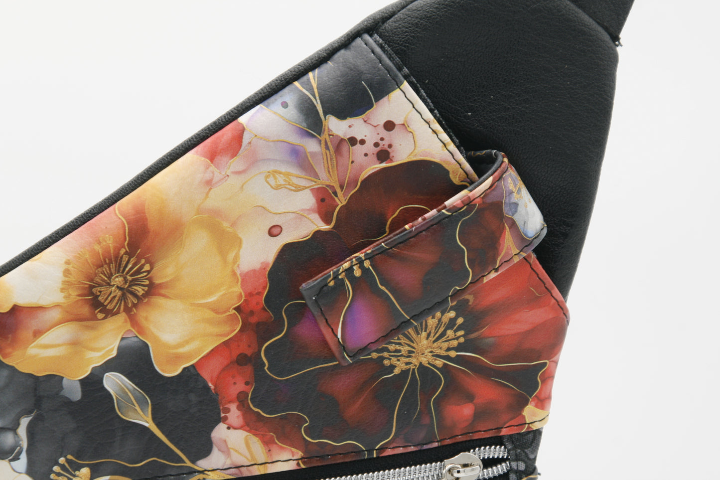 Front slip pocket with snap closure keeps phone secure – Designed for quick access to your phone, keys, or small items.
