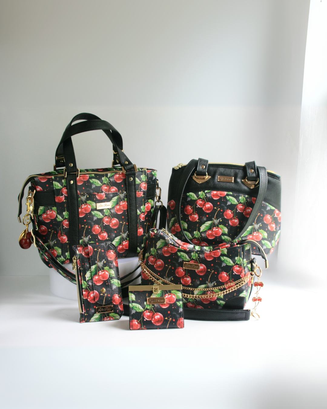 one tote, two purses, and two wallets in the Cherries Jubilee Collection