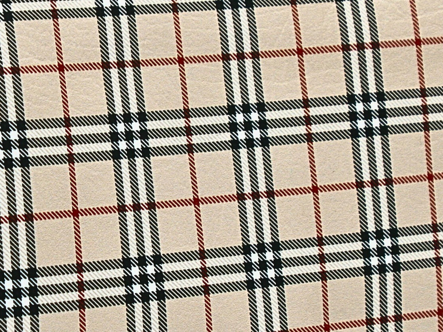 The tartan vinyl has a slight texture like leather as seen in this close up.