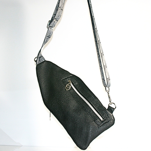 Frosted Obsidian Mini Traveler Sling Bag in white, gray, and black faux leather