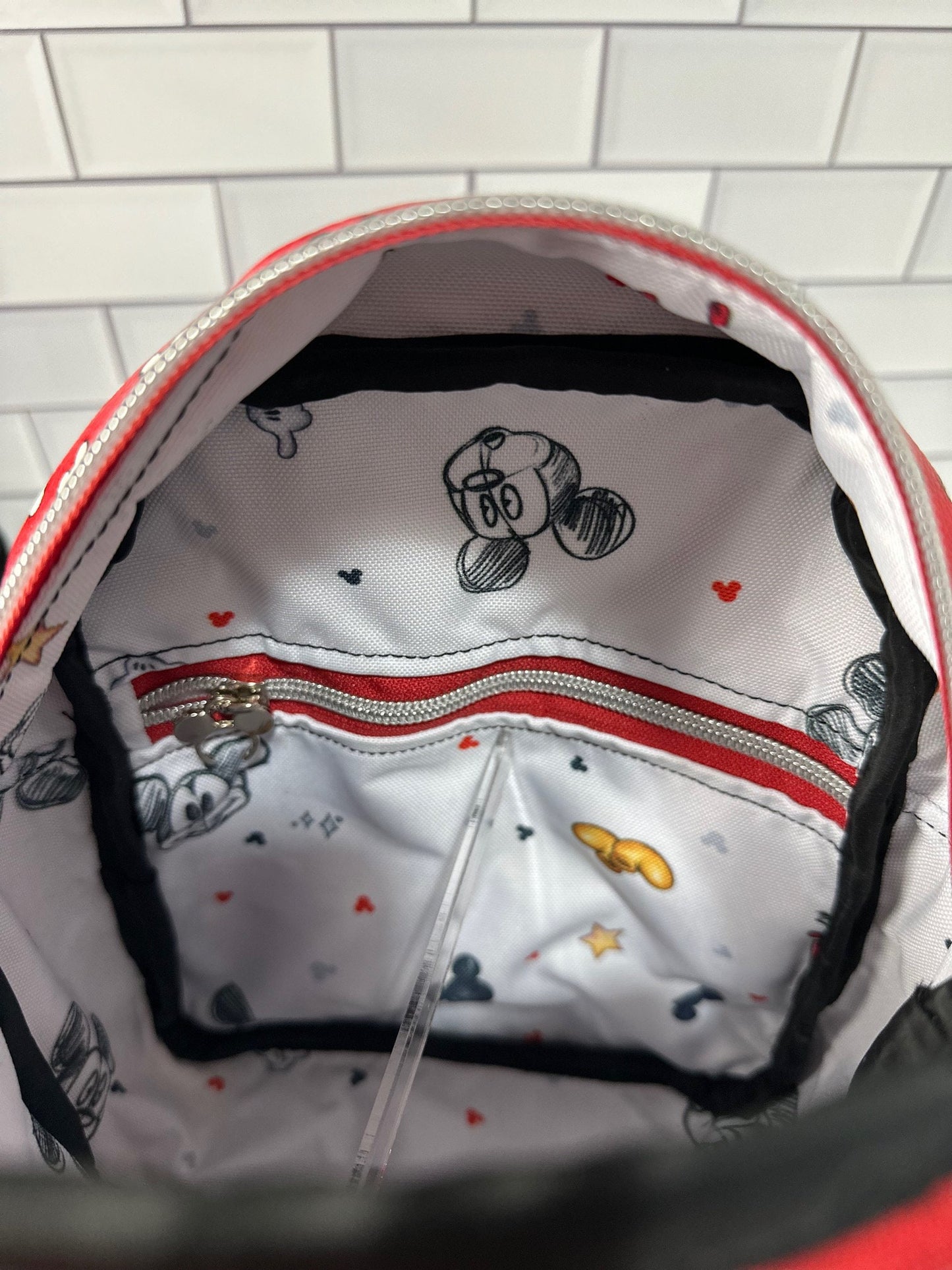 Interior zipper pocket in the Classic Mouse Backpack