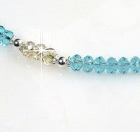 Light turquoise and golden shadow swarovski crystal rondelles
