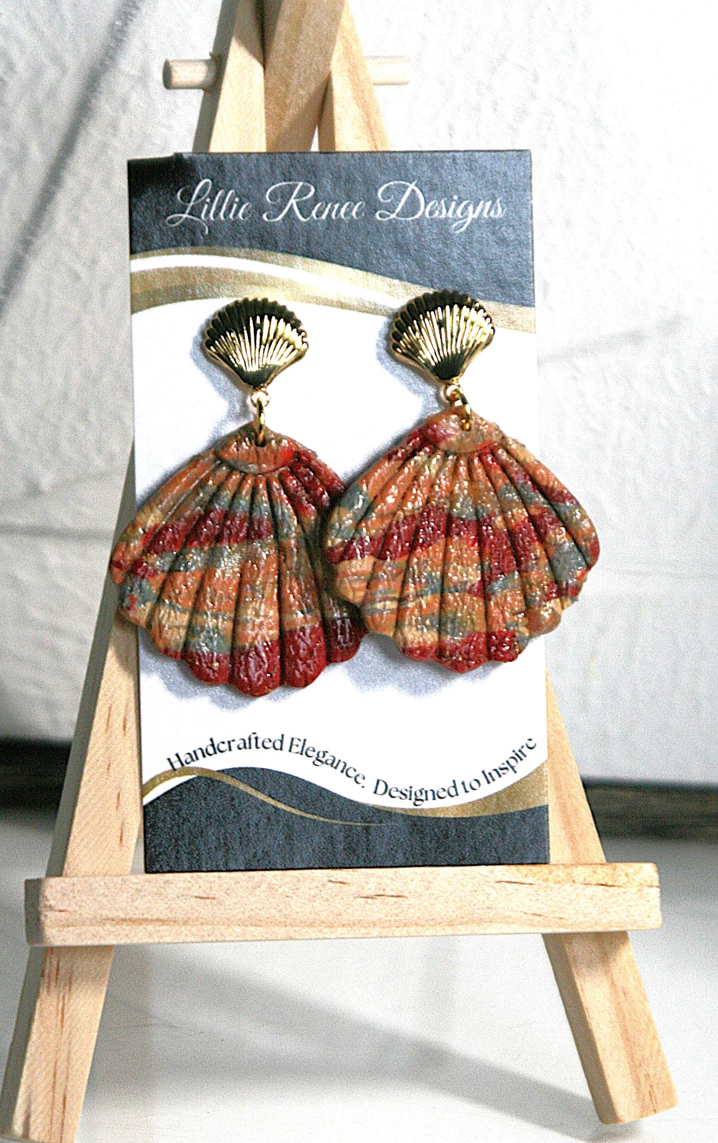 Rust, yellow and sage green shell earrings with a gold shell post