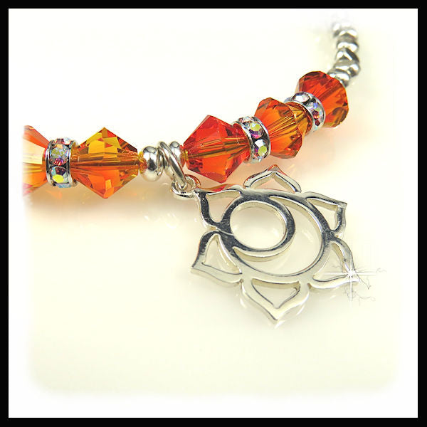sterling silver sacral chakra charm and Fire Opal Orange Swarovski Crystal bracelet