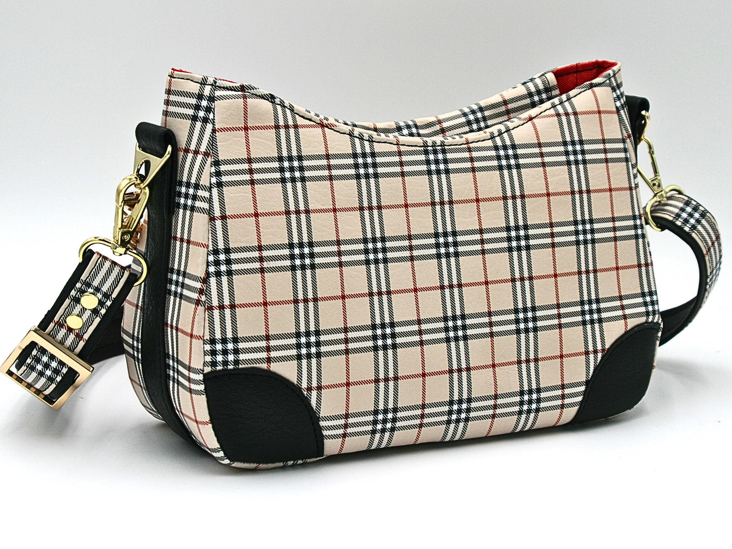 From the back of the Annabelle you can see the shoulder strap connector which goes along the bottom of the purse to the other strap connector.
