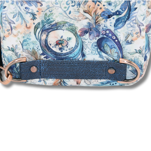 Double D-rings on the back of the blue paisley sling for the adjustable strap, making it effortless to wear on either shoulder for ultimate comfort.