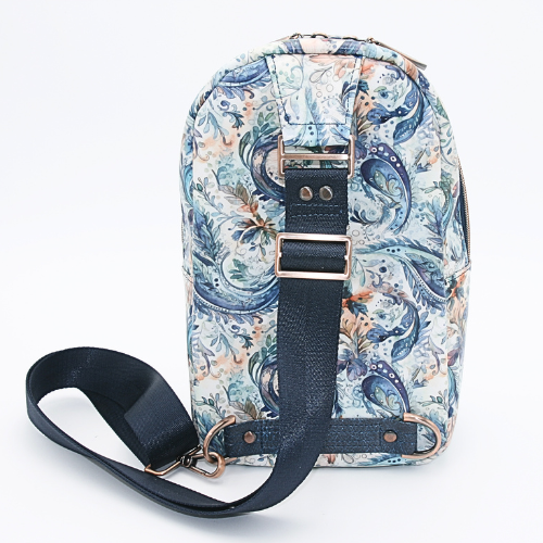 The blue paisley sling - A nylon webbing adjustable strap, allowing you to wear it on either shoulder.
