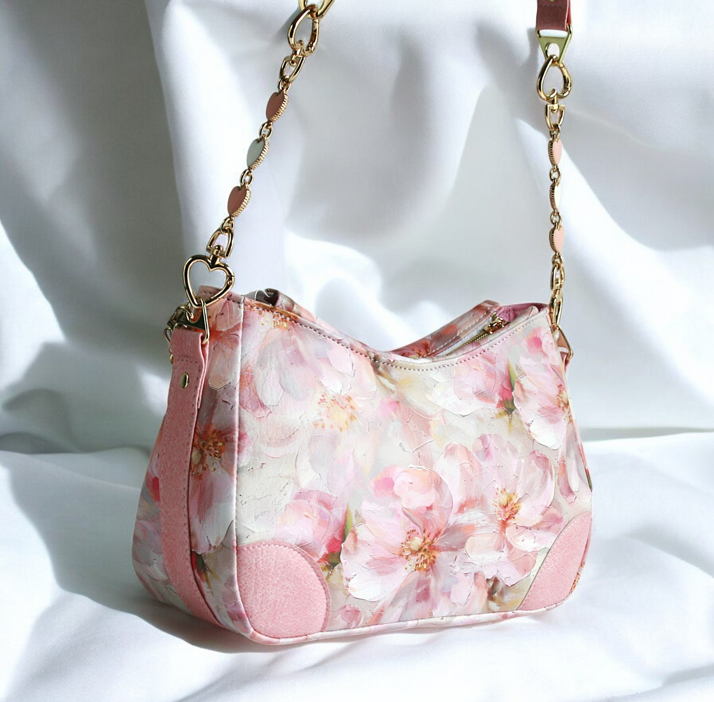 Handmade pink shoulder bag from the Passionate Pink Collection – front gold chain detail