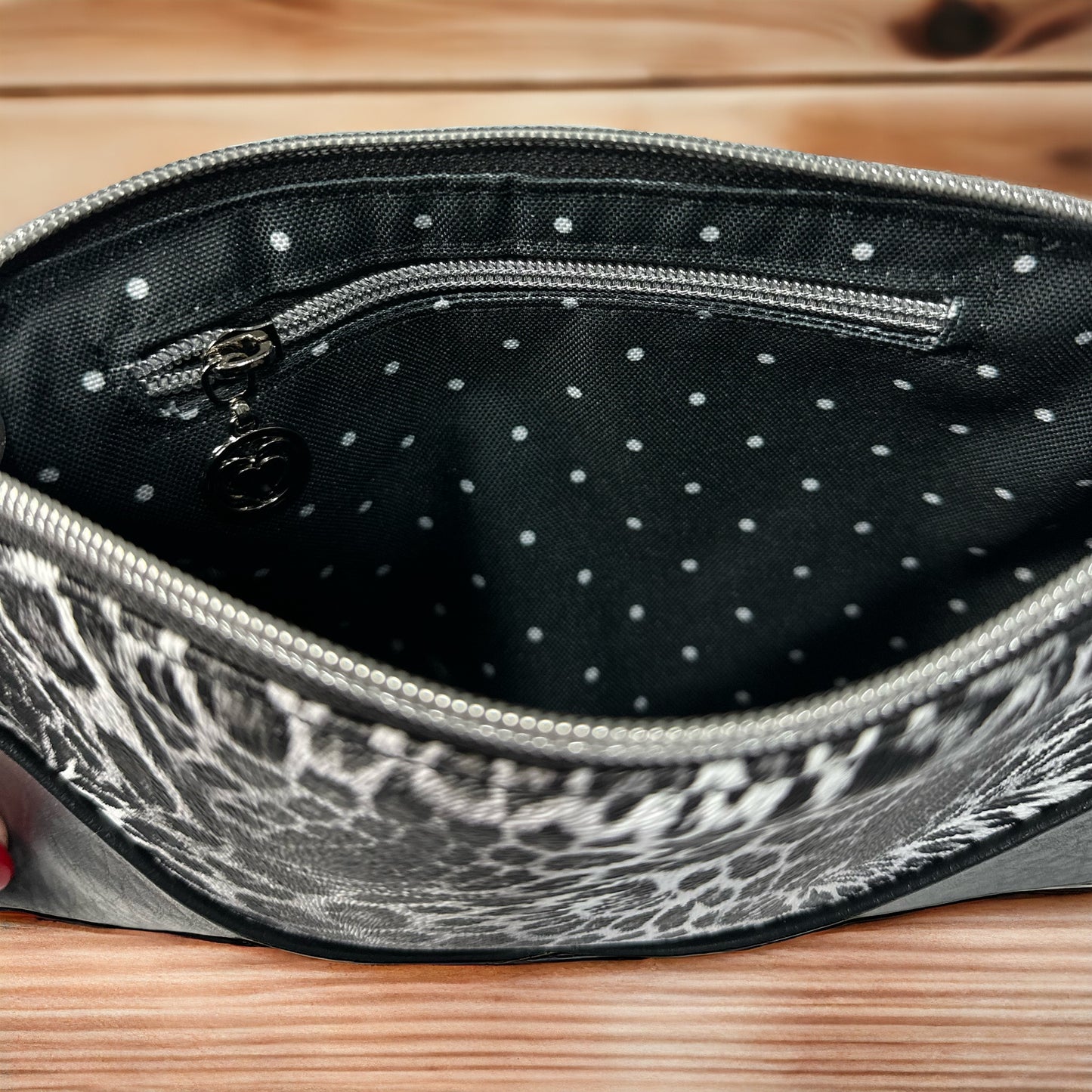 Fashionable
black Leopard animal Print Crossbody Bag – Handmade with a Water-Resistant Interior, Zippered Compartments, and Heart Zipper Pulls for a Touch of Elegance