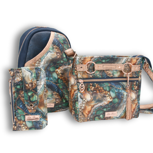 the Luxe Exotic Skin Editions featured these three products, the Rosie Sling, The Momexa and the Purse Pall Wallet