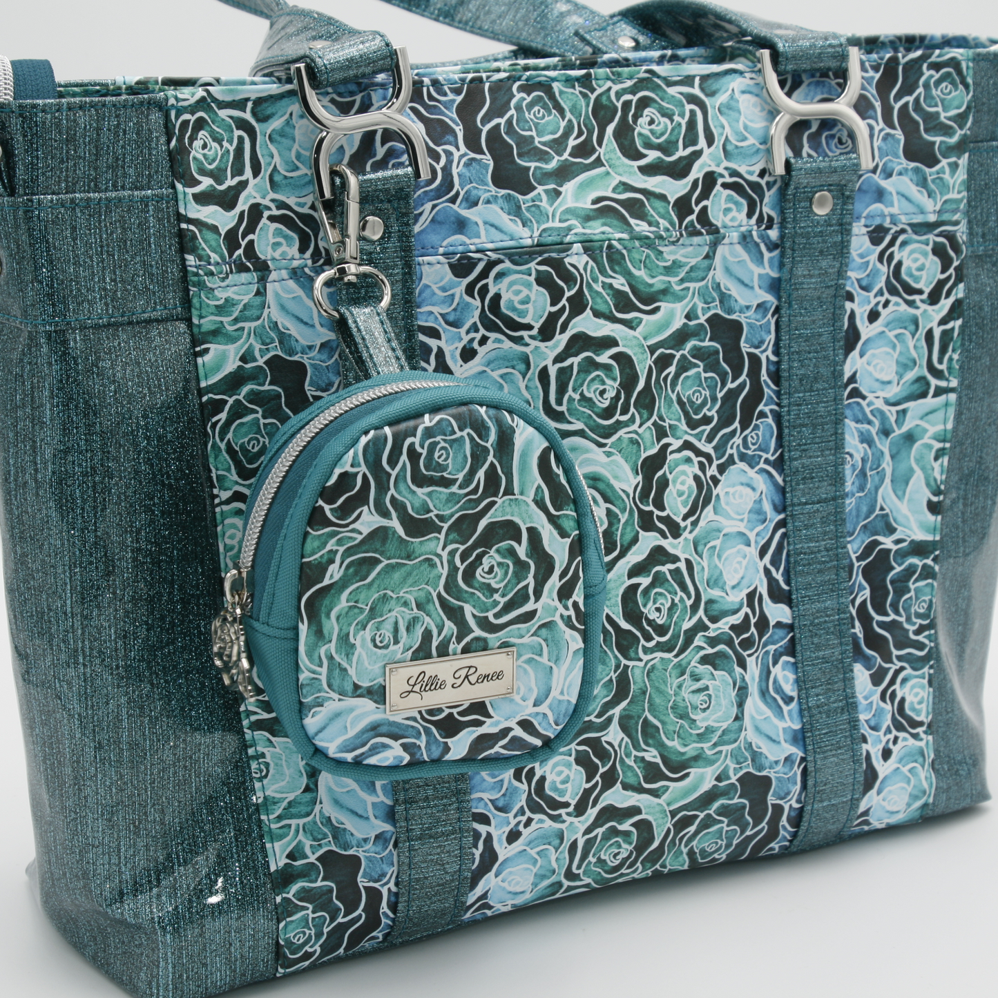 Front & Back Exterior Pockets – Easy access to phone, keys, or small accessories. also a comparison can be made here with the size of the tote and the tagalong Bitty Bag
You can see the size comparison between the Mr. Heckles Tote and the Clip On Bitty Bag.