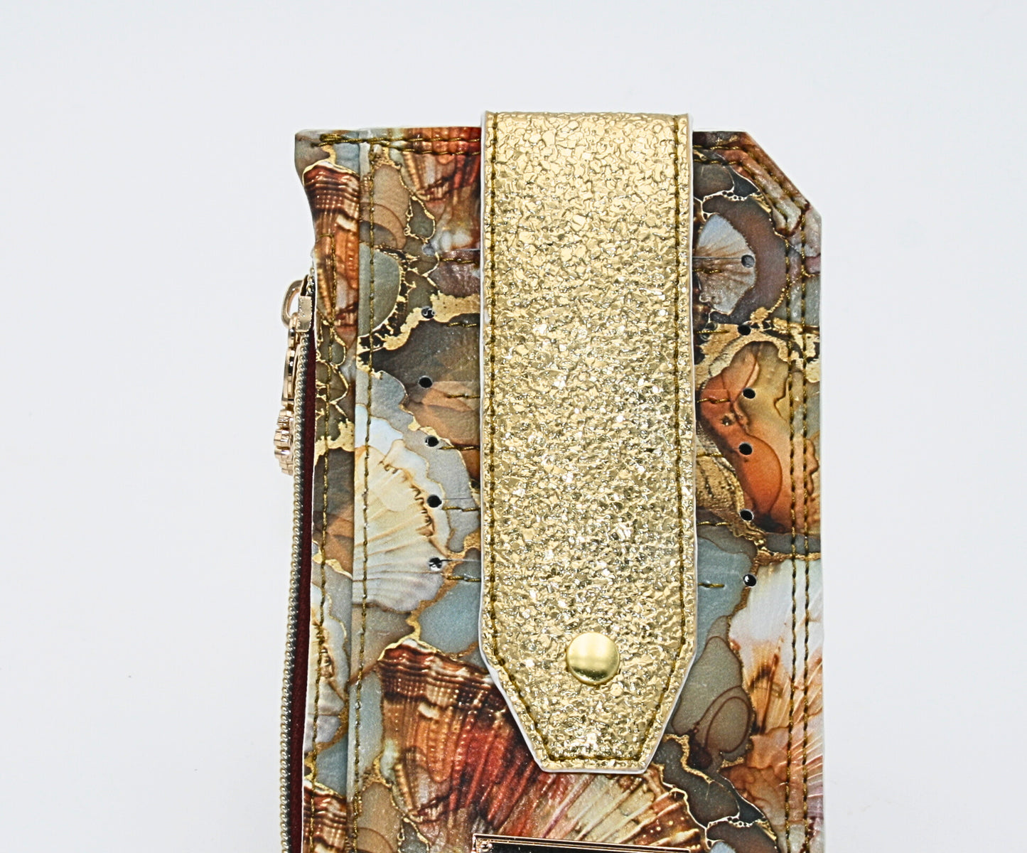 Six card slots – Perfect for keeping credit cards, ID, and gift cards organized. a snapped strap holds the credit cards secure