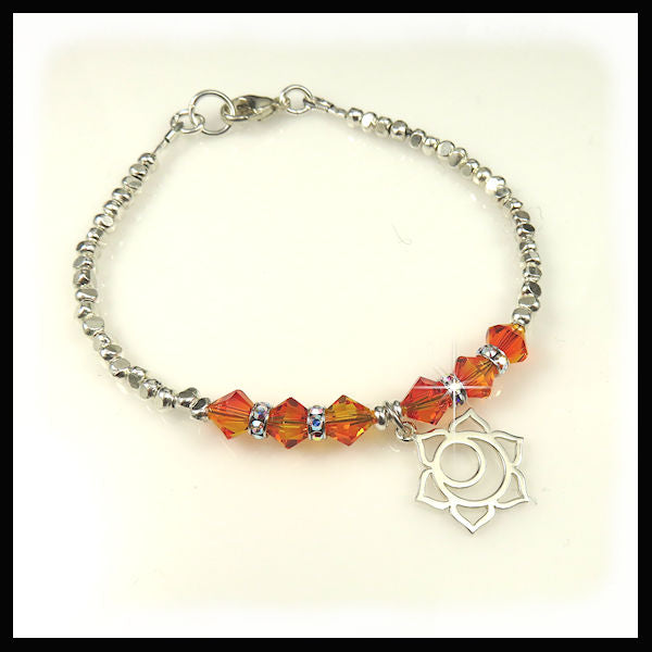 sterling silver nuggets and orange fire opal swarovski crystal bracelet with a sacral chakra charm