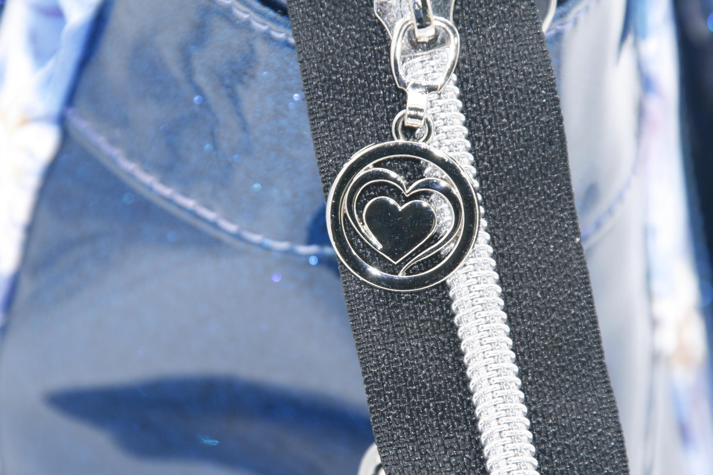 the double heart zipper pull and glitter vinyl