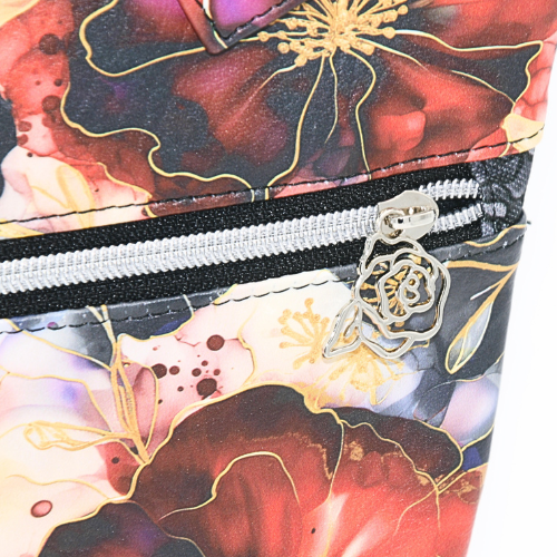 Front & back zipper pockets – Keep your essentials secure and easily accessible.
✔ Rose zipper pulls – Unique silver hardware is a feminine detail that adds a touch of charm.