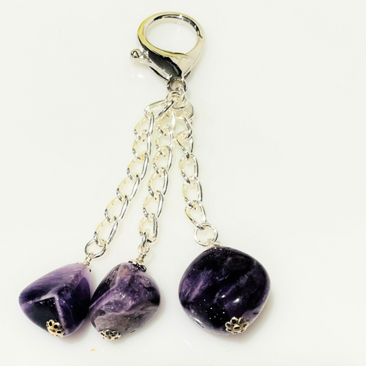  Genuine Amethyst Stones – Beautiful natural purple hues, known for their calming and protective properties. 