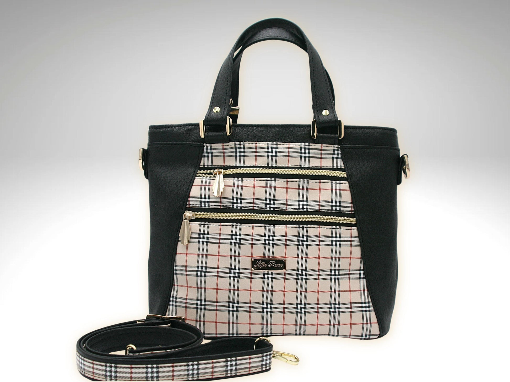 a medium sized tote that can be used also as a purse.  The exterior is made of a tan, black and red tartan vinyl and black faux leather.  The front has two zipper pockets, two grab handles and a crossbody strap