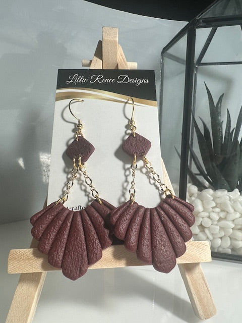 Burgundy polymer clay fan earrings on gold plated chains.  3" long earrings