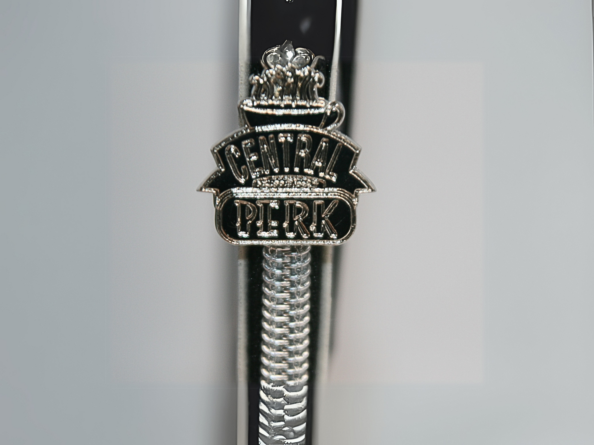 Accented with a Central Perk zipper pull, silver hardware, and a compact, stylish design. A must-have accessory for fans of the classic sitcom who love functional and trendy wallets.