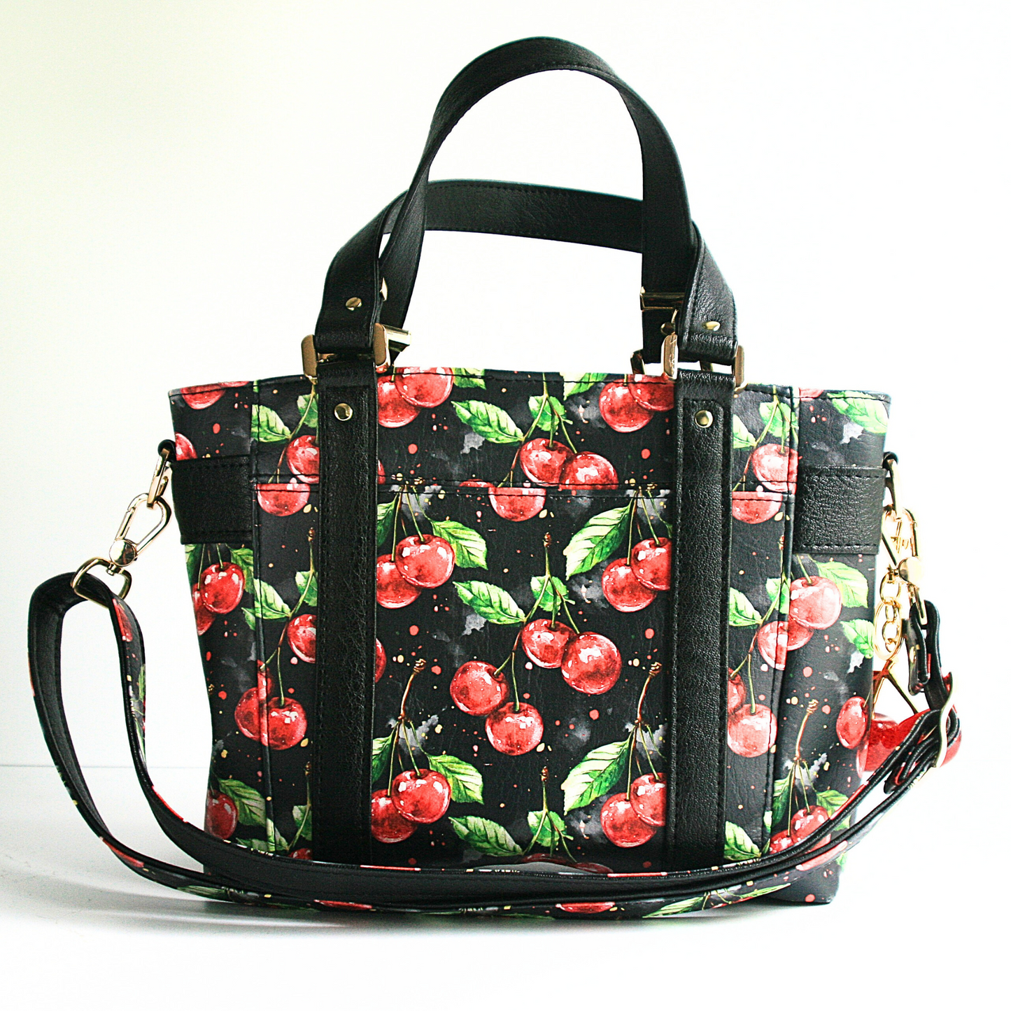 Back of the Mr. Heckles Cherries jubilee tote bag with handles and crossbody strap