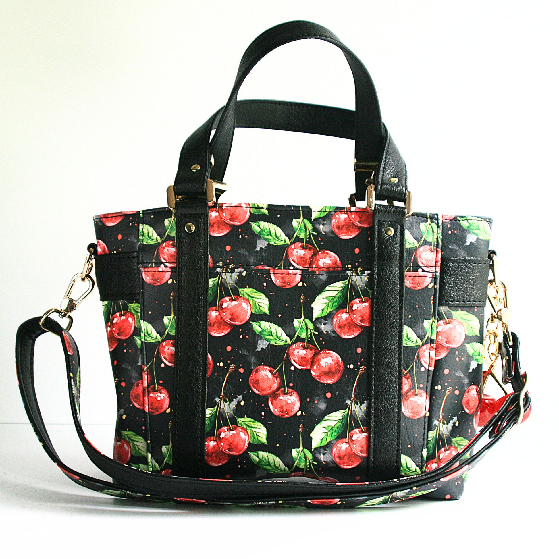 Back of the Mr. Heckles Cherries jubilee tote bag with handles and crossbody strap