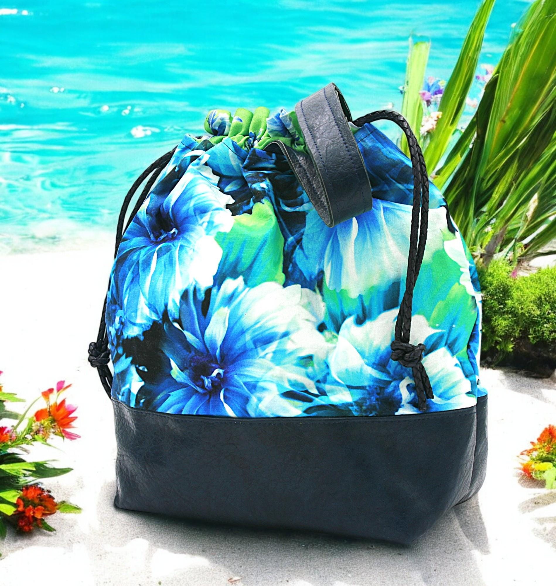 Floral Bloom Drawstring Bucket Bag in floral cotton with navy faux leather – handcrafted bag with 6 interior pockets