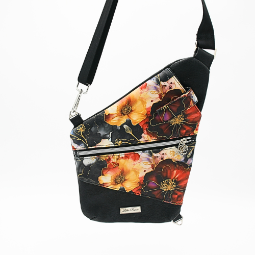Elegant black, burgundy & gold floral vinyl exterior – A luxurious and sophisticated floral design perfect travel bag. Adjustable nylon webbing strap – Customize your fit for ultimate comfort.