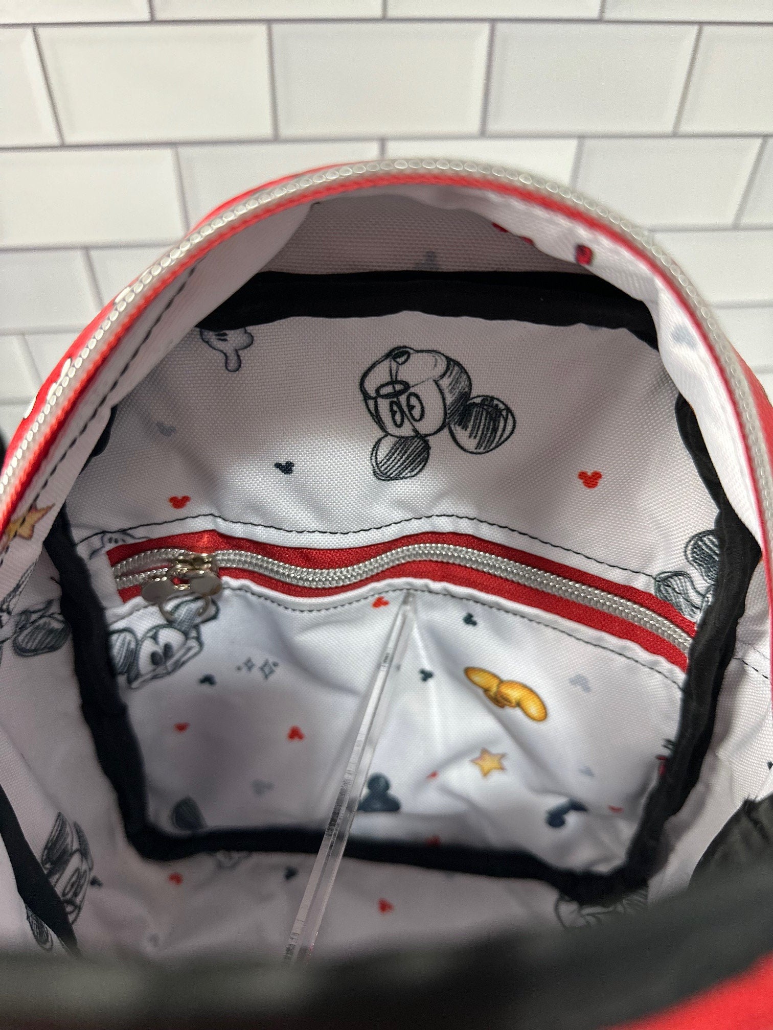 Interior zipper pocket in the Classic Mouse Backpack