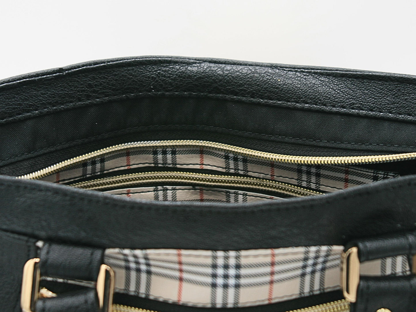 The interior of the Apothecary bag is black water resistant canvas with a vinyl zipper overlay.