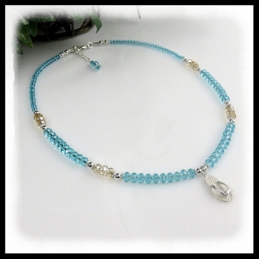 Sterling silver flip flop charm on light turquoise and golden shadow swarovski crystal necklace