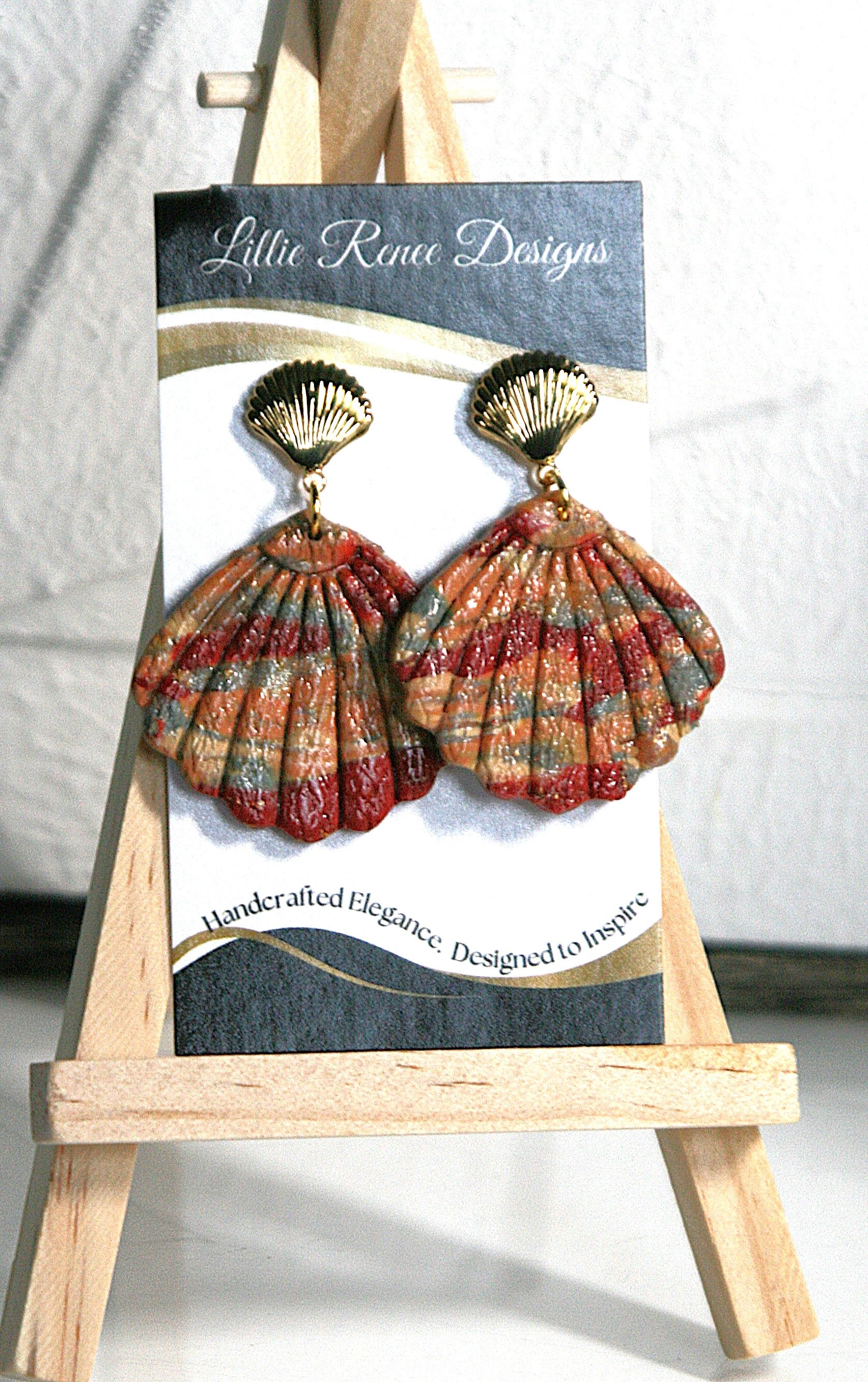 Rust, yellow and sage green shell earrings with a gold shell post