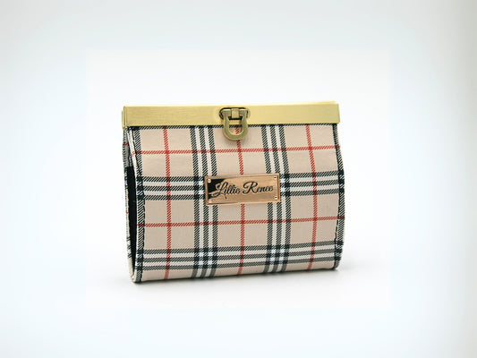 This compact tan tartan plaid accordion wallet holds 10+ credit cards, business cards and cash, keeping your essentials organized