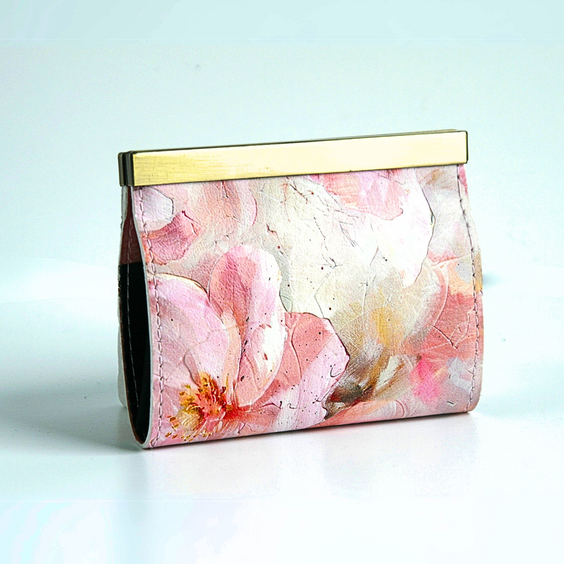 back of the Handmade Pink Floral Accordion Card Wallet with gold flip-lock bar, holds over 10 cards and cash and great for business cards as well