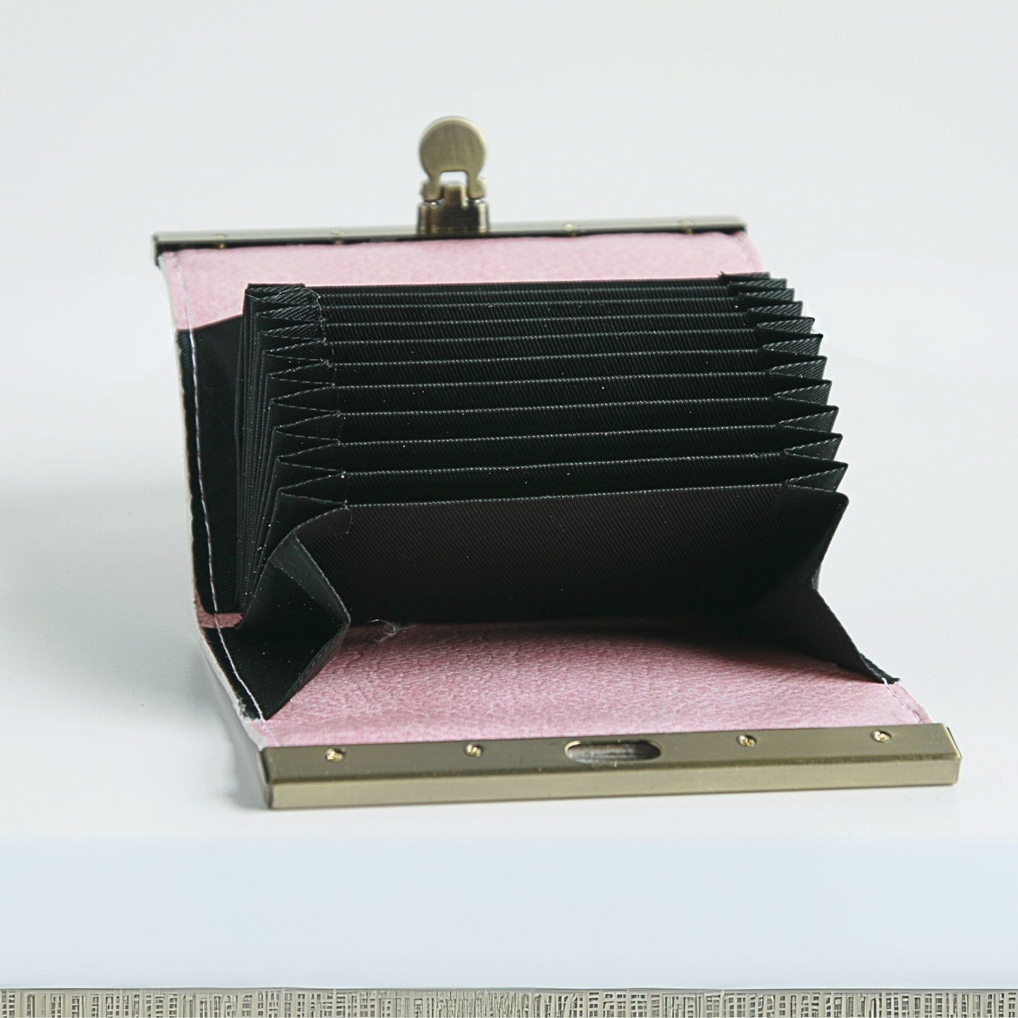 Inside of the Handmade Pink Floral Accordion Card Wallet with gold flip-lock bar, holds over 10 cards and cash and great for business cards as well