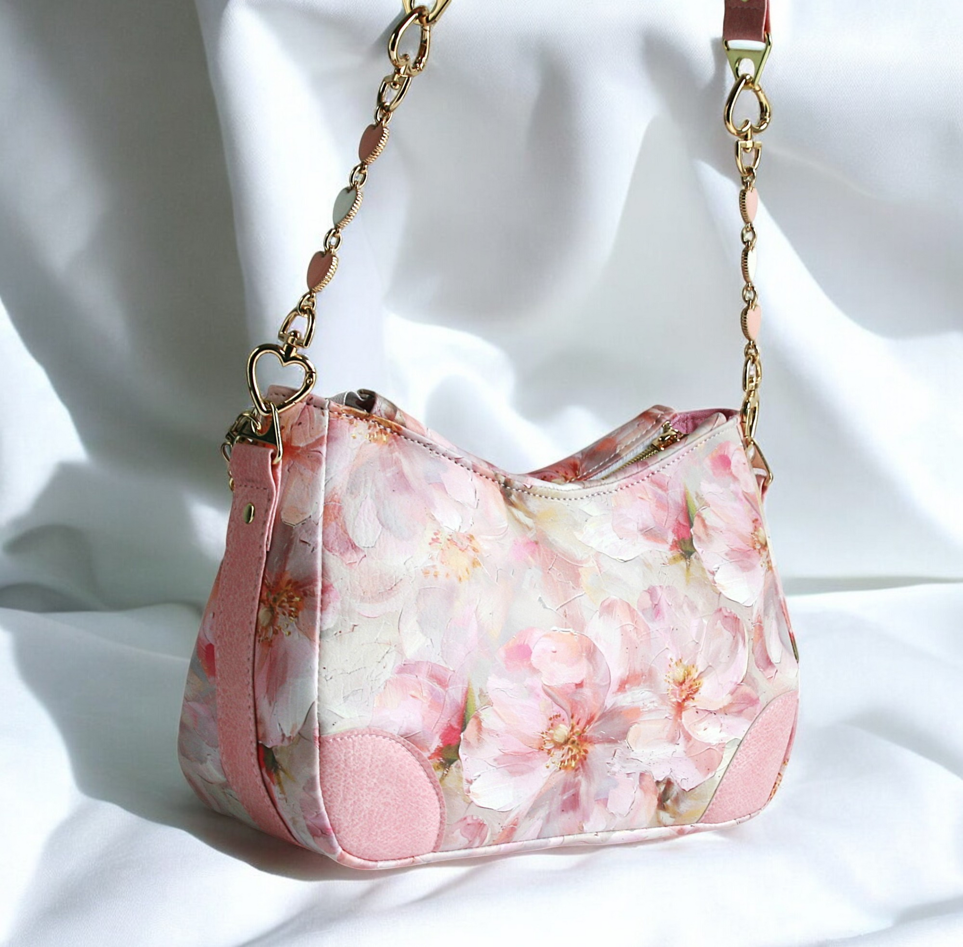Handmade pink shoulder bag from the Passionate Pink Collection – front gold chain detail