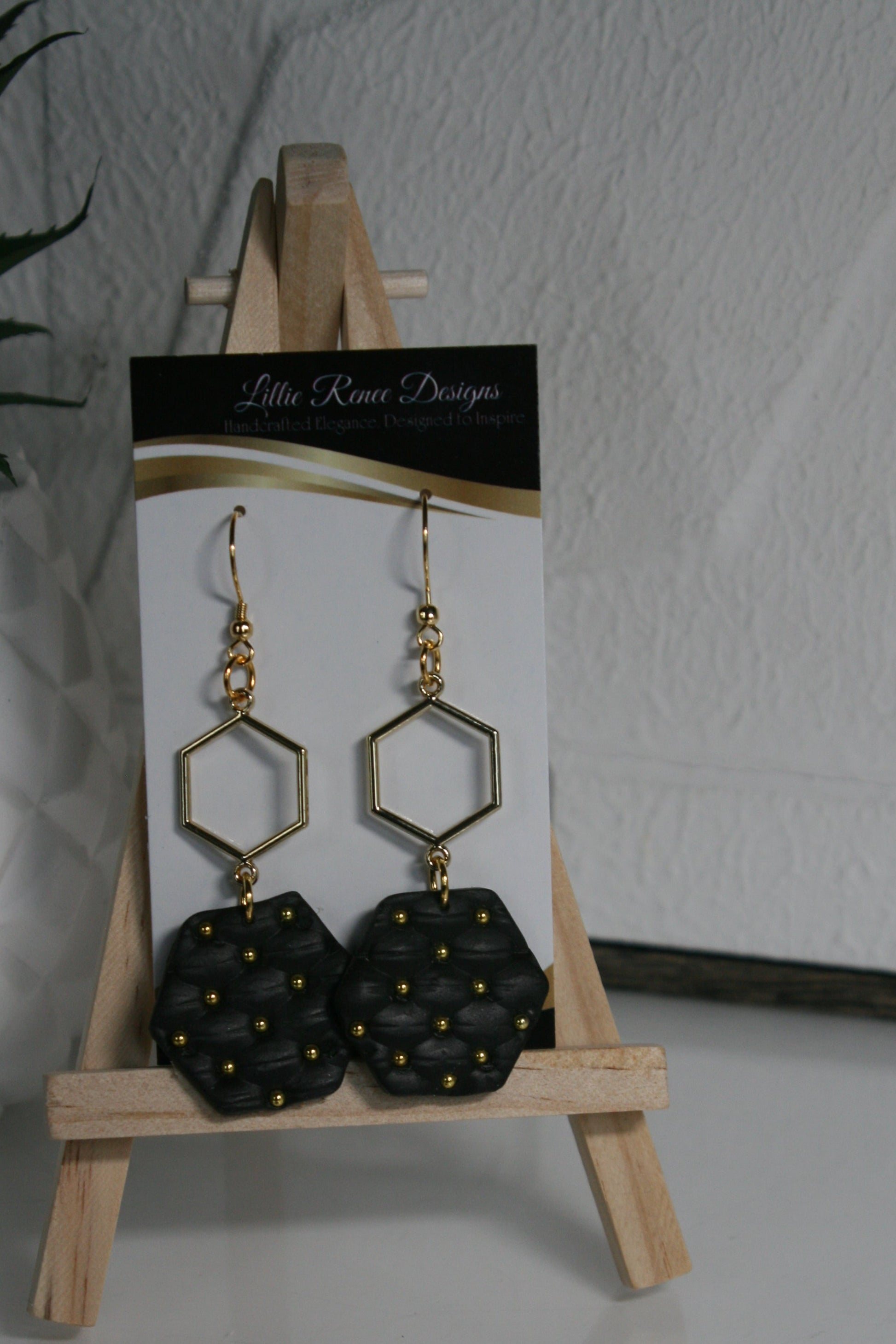 black faux quilted polymer clay earrings with gold plated beads and  hexagon connector