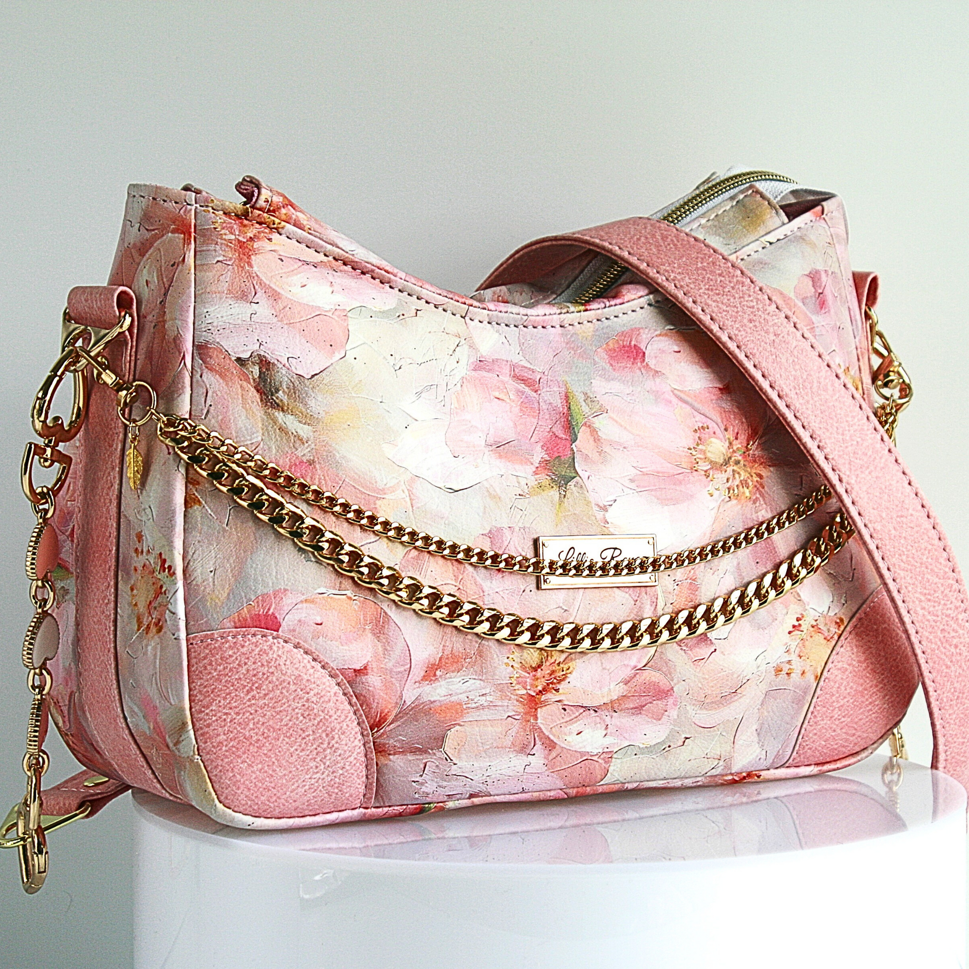 Handmade purse with pink and white floral design and waterproof canvas lining