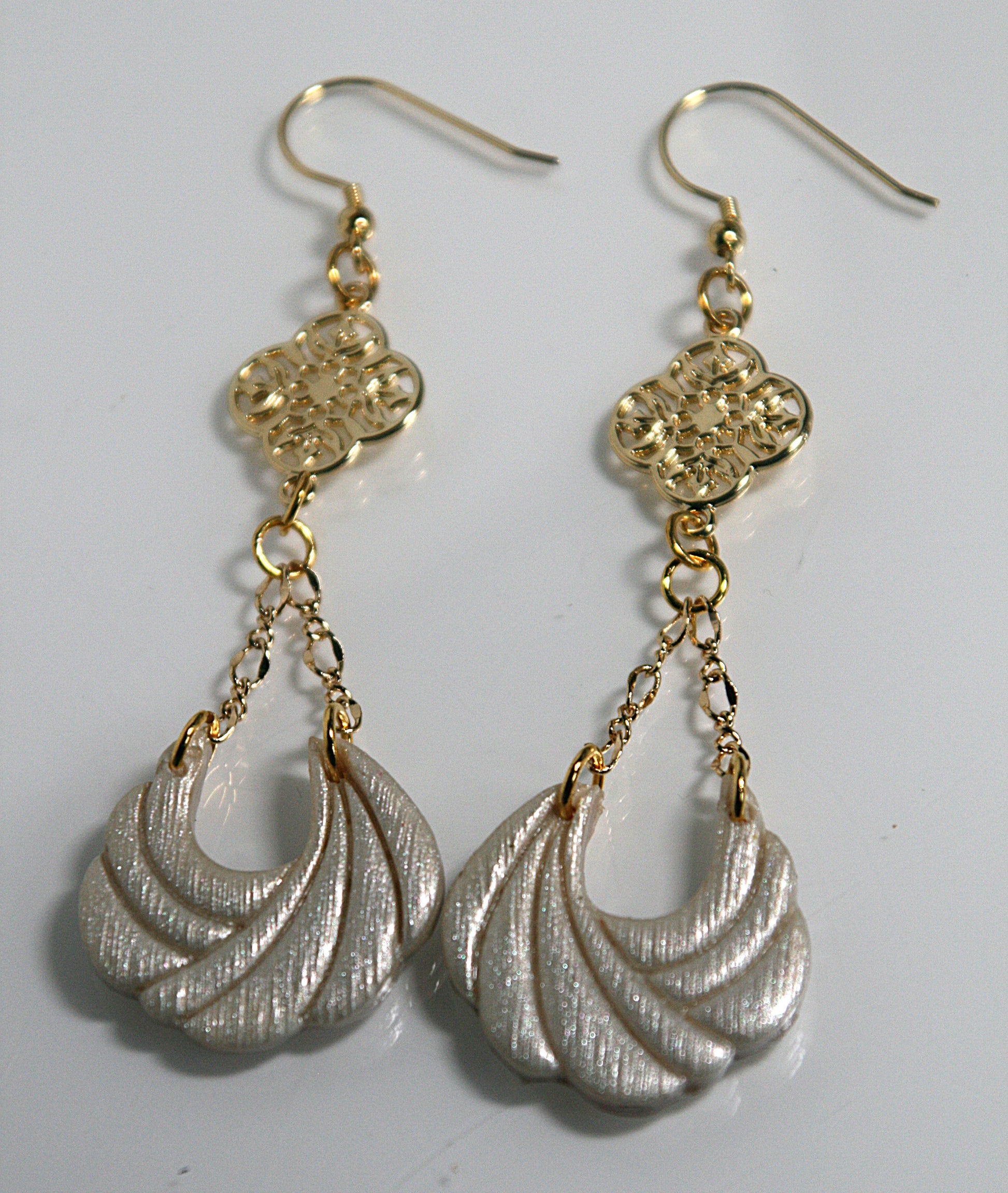 Ivory shimmer polymer clay and gold plated shoulder dusters with gold plated connector