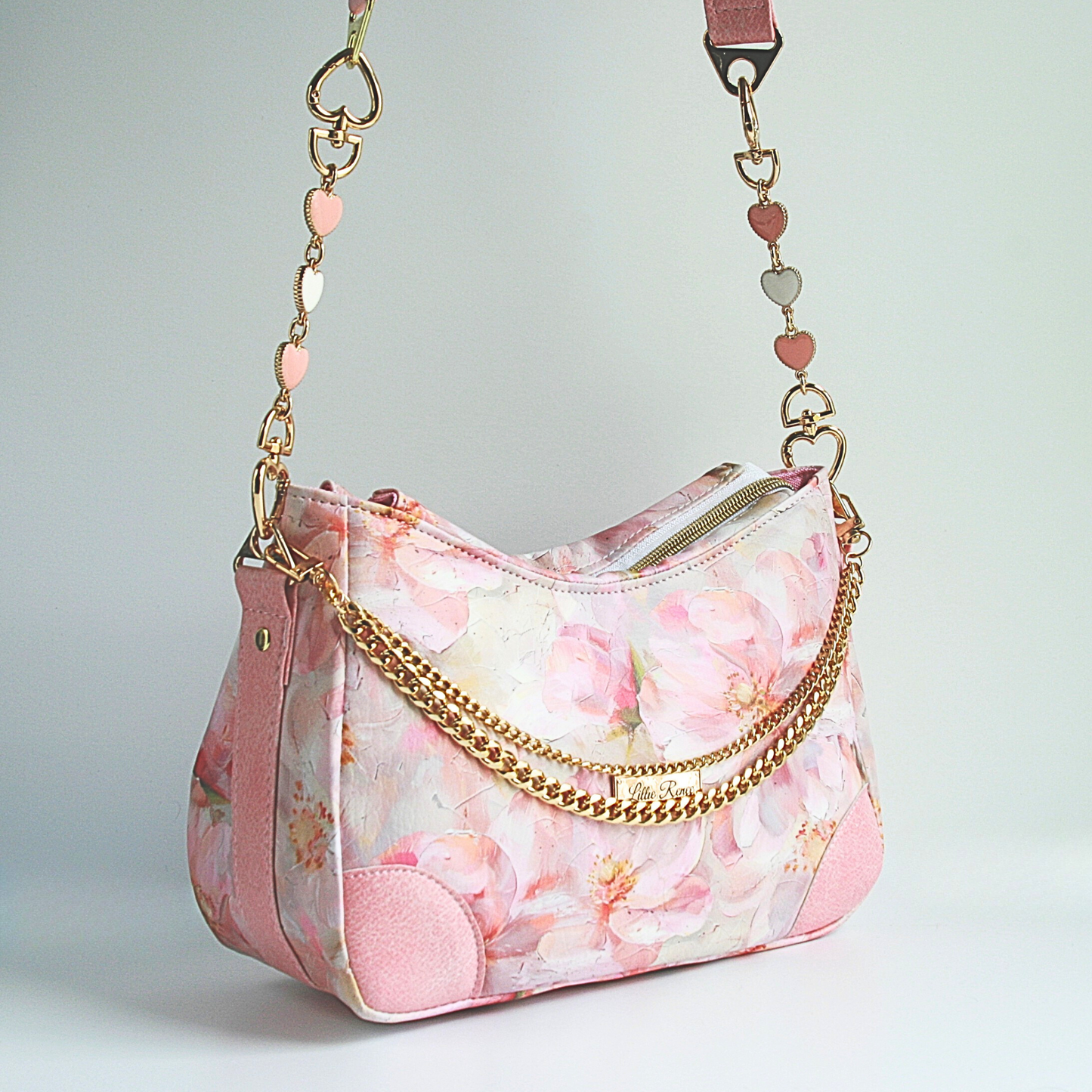 Handmade pink shoulder bag from the Passionate Pink Collection – front gold chain detail