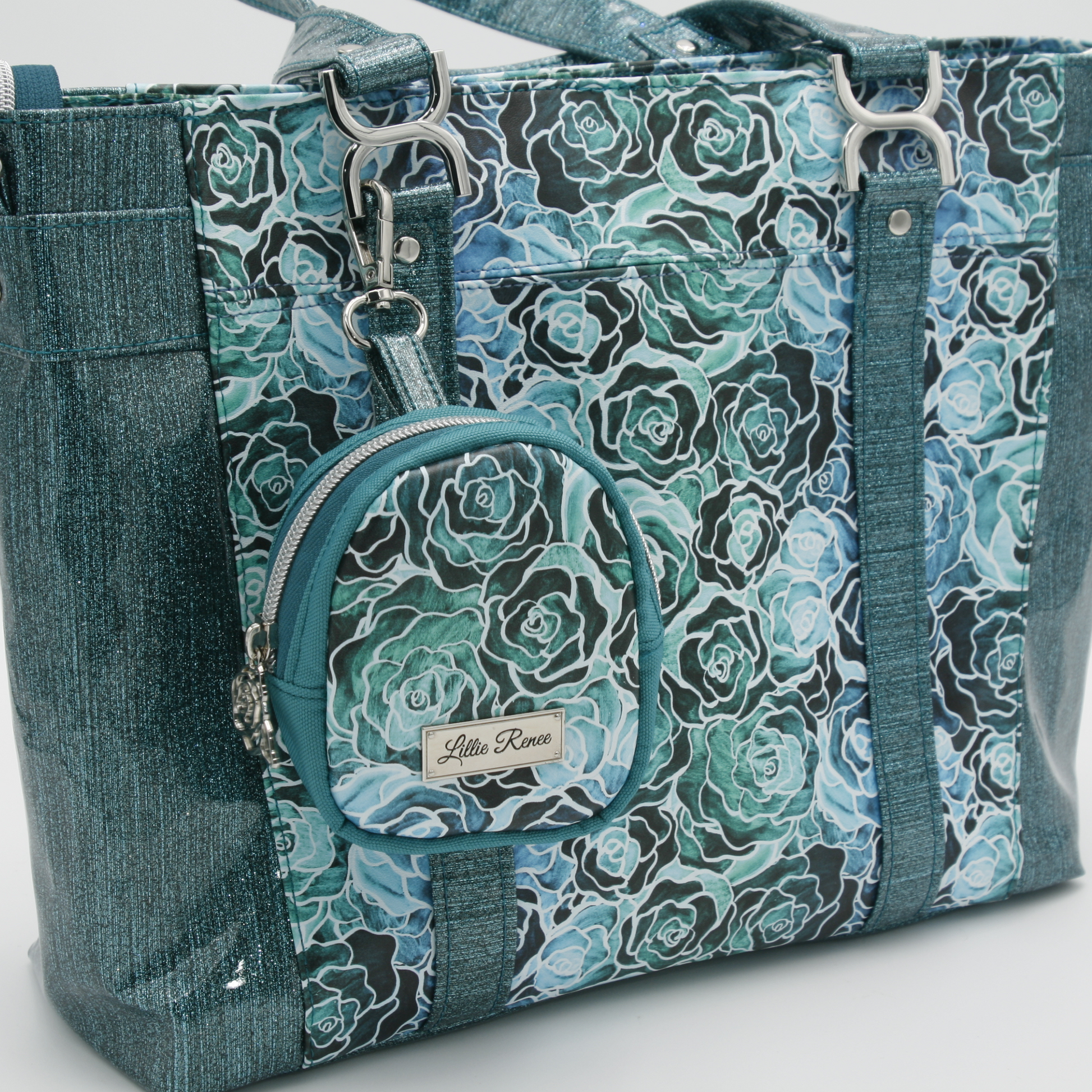 Front & Back Exterior Pockets – Easy access to phone, keys, or small accessories. also a comparison can be made here with the size of the tote and the tagalong Bitty Bag
You can see the size comparison between the Mr. Heckles Tote and the Clip On Bitty Bag.