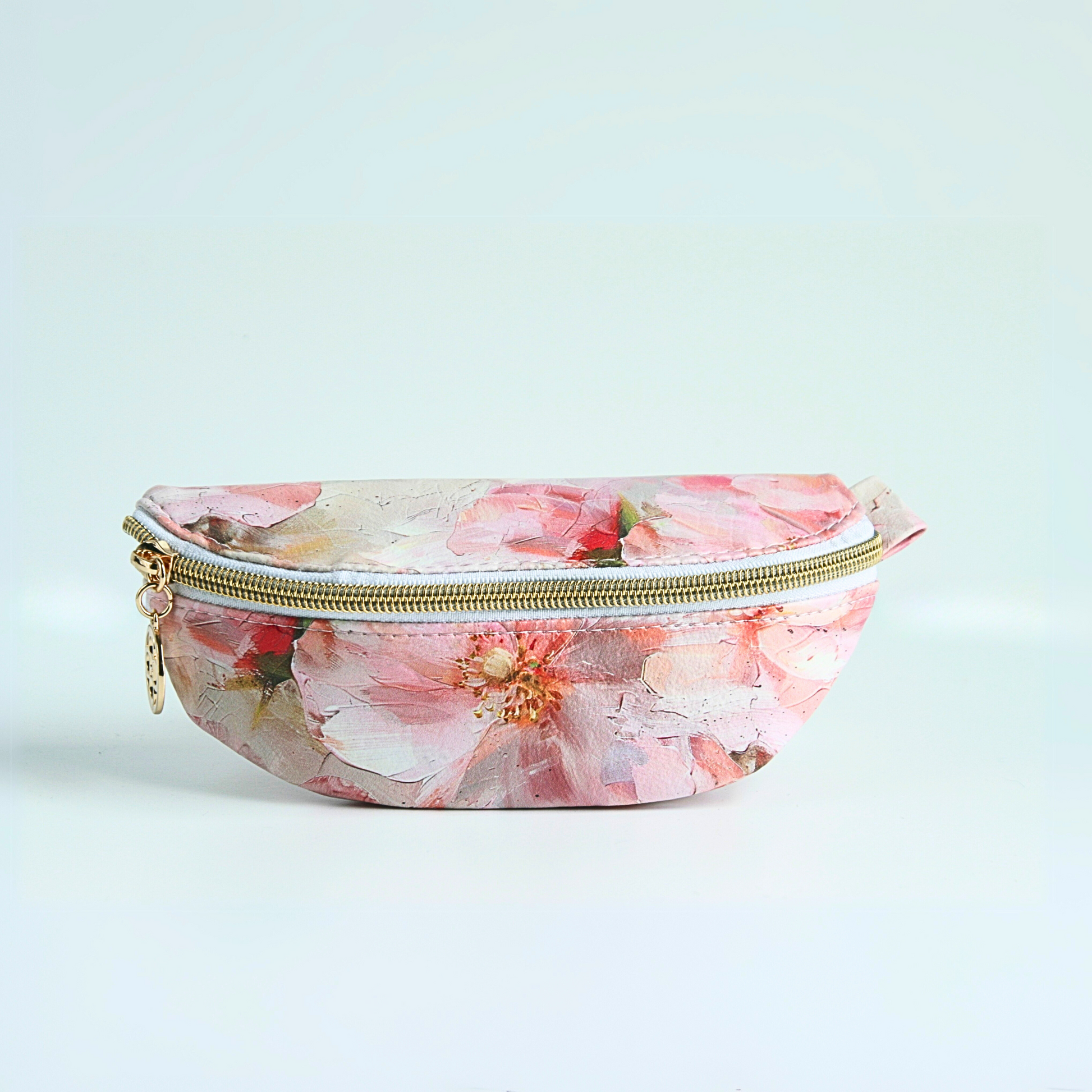 Handmade medium pink floral sunglass case with water-resistant canvas interior and gold zipper hardware from the Passionate Pink Collection.