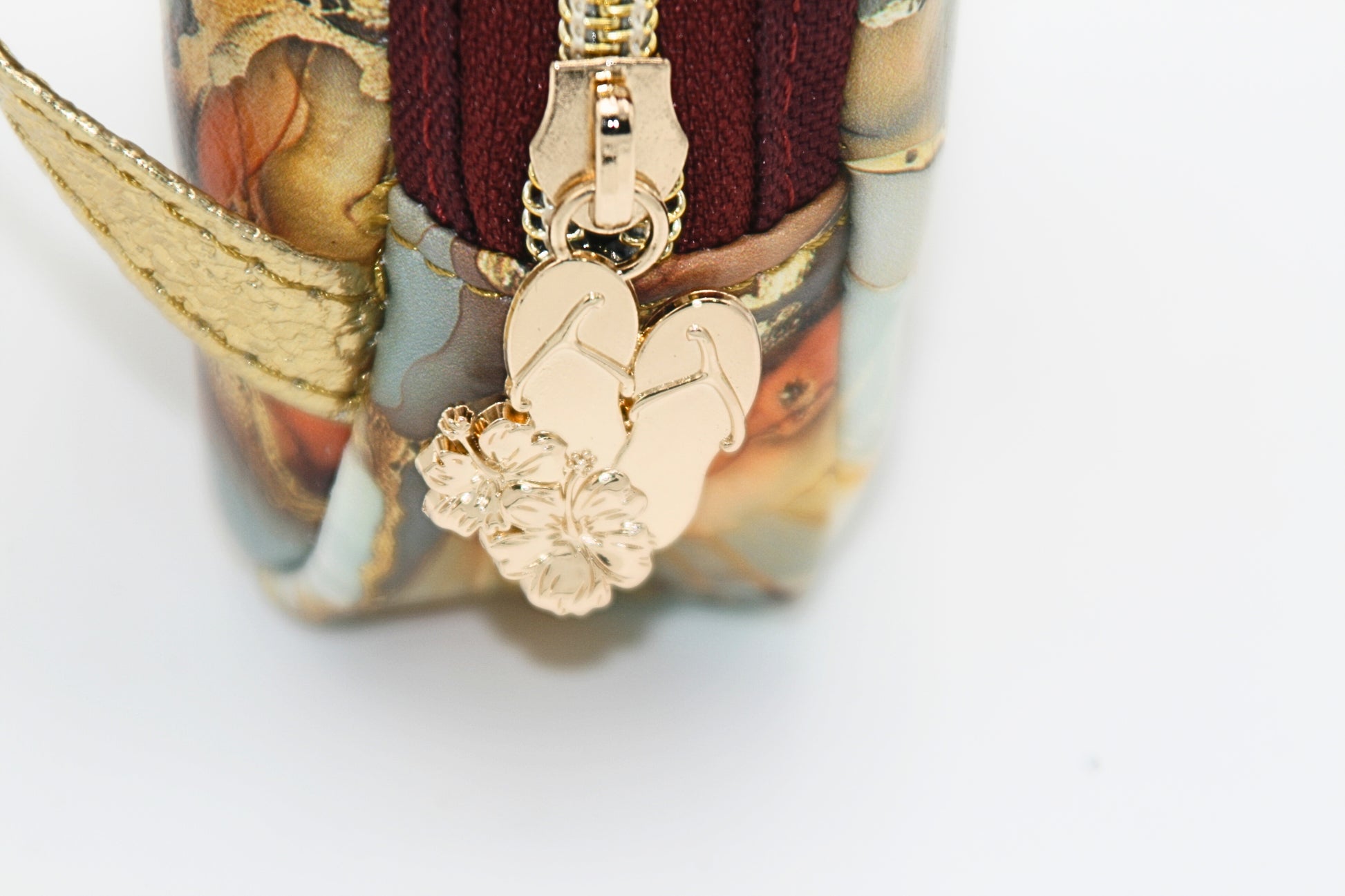 The zipper closure with flip-flop zipper pulls for easy opening  