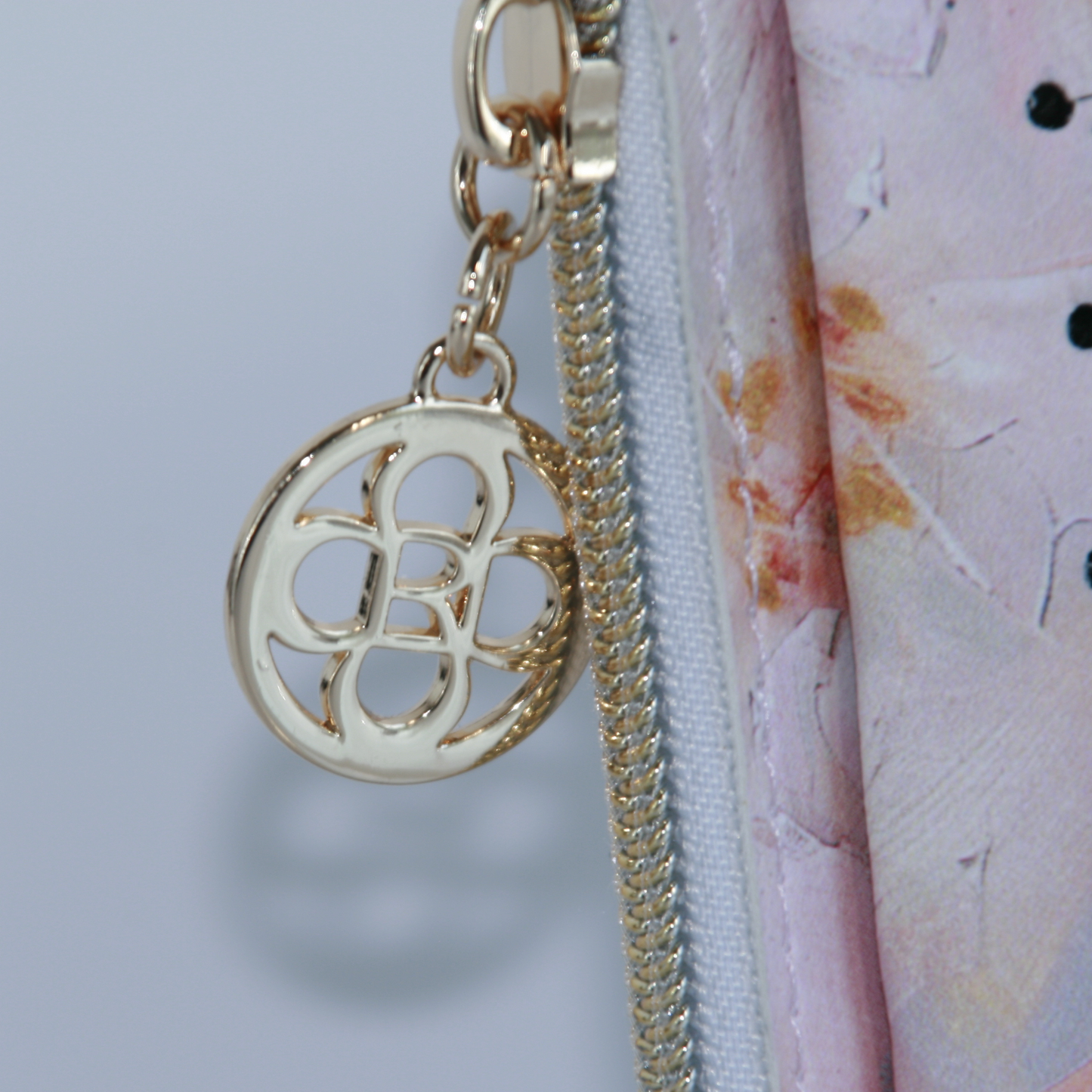 Zipper coin pocket to keep your change secure with unique gold hardware