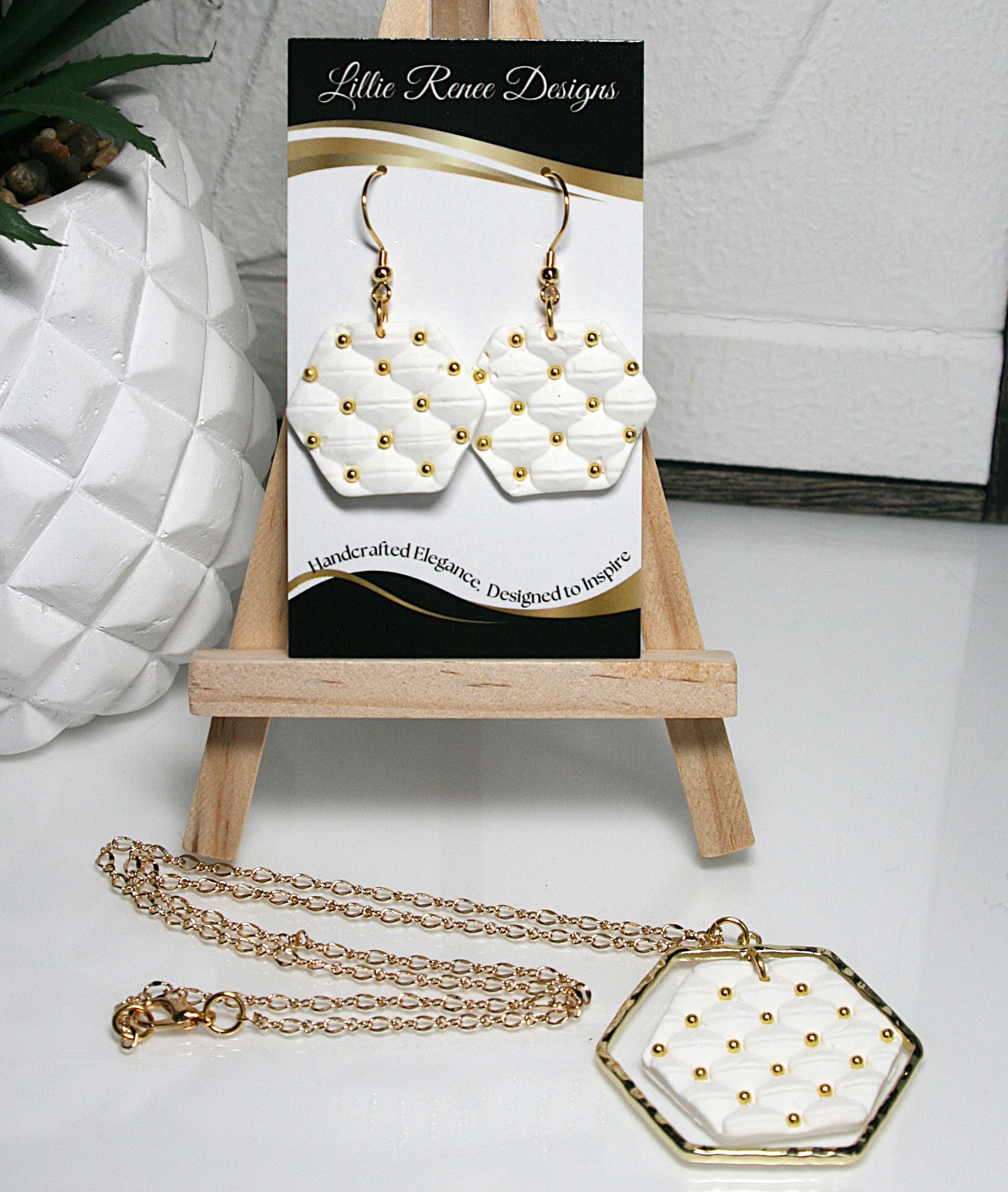 white polymer clay quilted texture earrings and necklace with gold components 